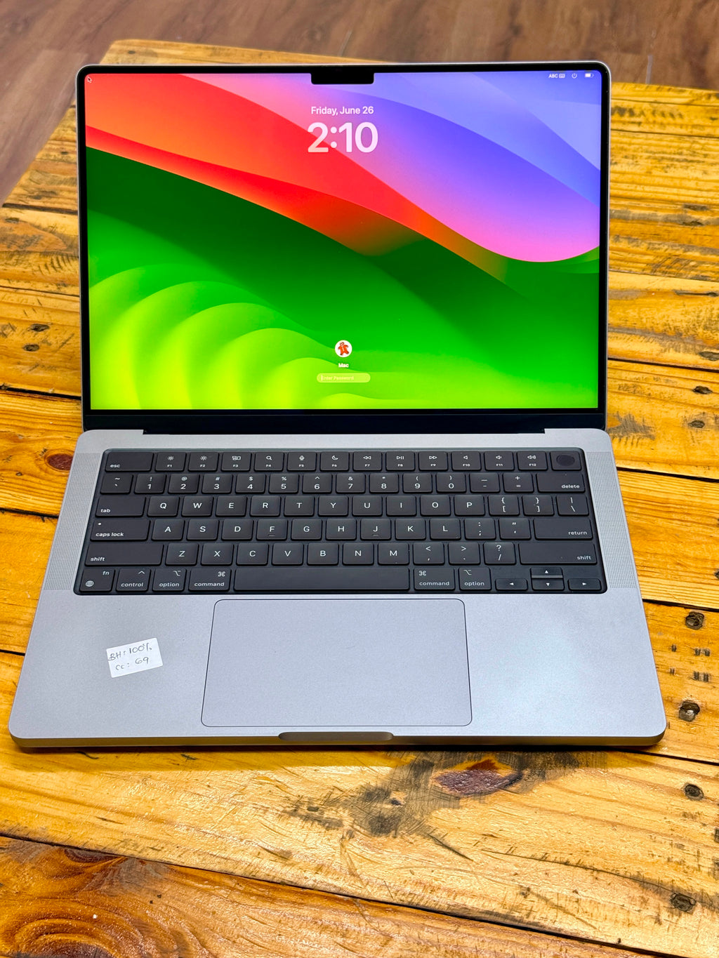 Apple MacBook Pro 2021 M1 Pro laptop with 16GB RAM and 512GB SSD, shown open with keyboard and screen visible.
